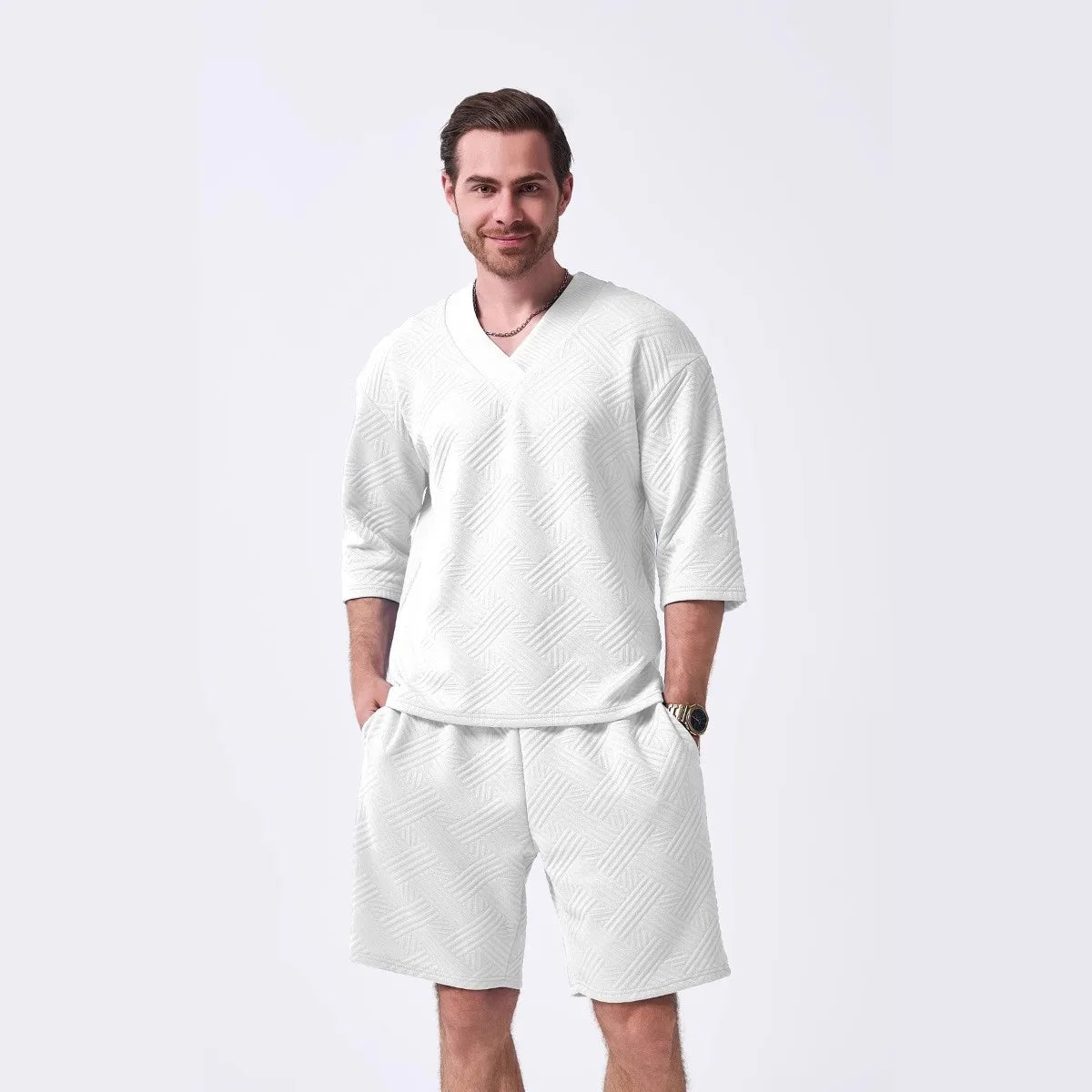 The 2025 new men's summer suit is a casual and versatile solid-color jacquard V-neck short-sleeved T-shirt with two shorts