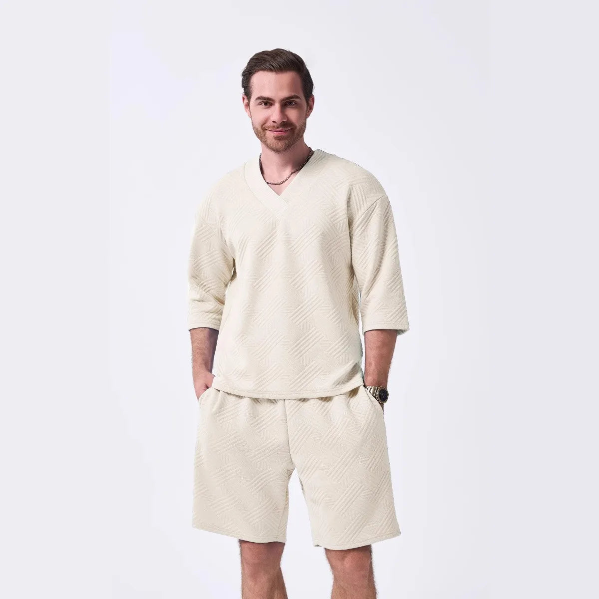 The 2025 new men's summer suit is a casual and versatile solid-color jacquard V-neck short-sleeved T-shirt with two shorts