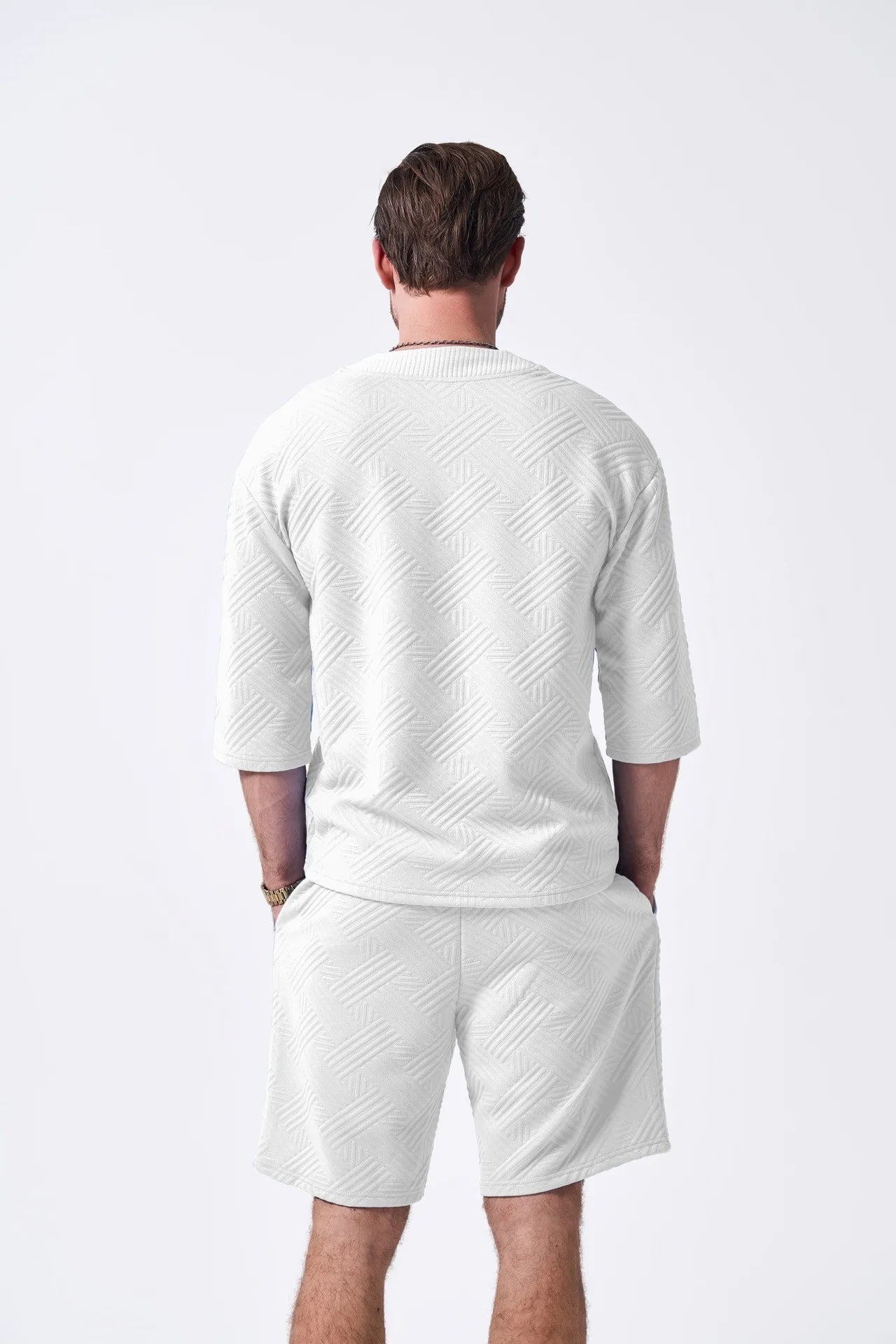 The 2025 new men's summer suit is a casual and versatile solid-color jacquard V-neck short-sleeved T-shirt with two shorts